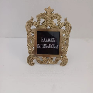 Decorative metal photo <b>frame</b> with antique brass finished and intricate floral designs perfect for elegant interiors - Product Image 1