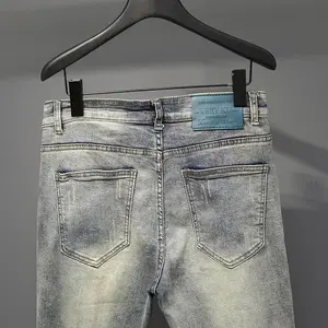 กางเกงยีนส์ลำลองผู้ชายผ้าฝ้ายผสมสแปนเด็กซ์คุณภาพสูง แบรนด์ดีไซเนอร์สุดฮิต ดีไซน์วินเทจ ทรงเข้ารูป ป้องกันการเป็นขุย - Product Image 4