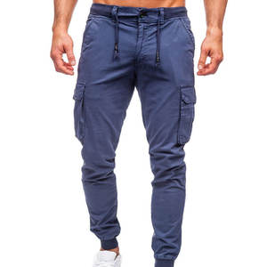 Pantalon cargo homme Premium Pockets, coupe slim, couleur jaune uni, respirant, poches fonctionnelles, idéal pour le sport, nouvelle collection, meilleure qualité. - Product Image 1