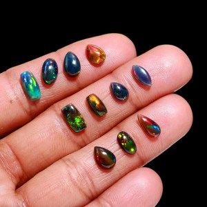 โอปอลไฟสีดำธรรมชาติทรงรีแบบคาโบชอง ขัดเงา สำหรับทำเครื่องประดับ - Product Image 4