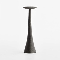 Table de bar sur pieds avec base conique haute et plateau surélevé, design compact, construction robuste, idéale pour les espaces de vie contemporains