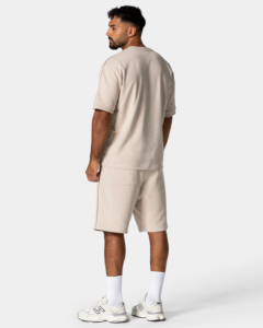 ชุดฤดูร้อนสีพื้นใส่สบายสำหรับผู้ชาย เสื้อยืดผ้าฝ้ายสั่งทำ กางเกงขาสั้นผ้าเจอร์ซีย์ ป้องกันขนร่วง ทรงหลวมไหล่ตก - Product Image 2