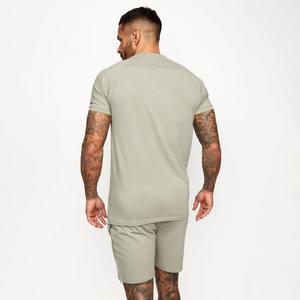 Ensemble T-shirt coupe-vent et short en coton biologique 2026 pour homme – Style streetwear 2 pièces avec logo frontal – Collection été pour homme - Product Image 2