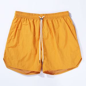 Pantalones cortos de playa atléticos de alta calidad para hombre, ropa de calle Lisa informal, tela de lona con patrón sólido ecológico, característica antiarrugas - Product Image 1