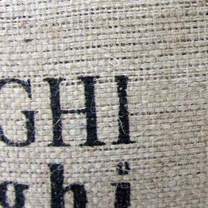 Pouf cylindrique vintage en toile de jute avec dessus en cuir marron, fait main, repose-pieds ottoman, style mid-century moderne, confortable, 45x50cm - Product Image 5