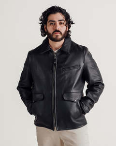 Chaqueta de moto de cuero genuino negro para hombre con cierre de cremallera y bolsillos, cuello vuelto, corte regular, para otoño e invierno. - Product Image 1