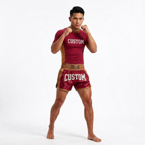 ชุดกางเกงมวยไทยแบบกำหนดเองพร้อมเสื้อรัดกล้ามเนื้อ ลายพิมพ์แบบรีดร้อน โพลีเอสเตอร์ 100% ยืดหยุ่น ระบายอากาศ แห้งเร็ว สำหรับ MMA มวยไทย คิกบ็อกซิ่ง - Product Image 1