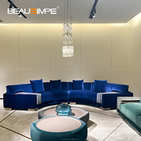 Juego de sofá de lujo moderno para sala de estar, tela azul y verde con nuevo diseño curvo para muebles de dormitorio de Villa o apartamento