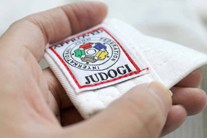 Professional White Karate Gi Set with Premium Quality Material, Reinforced Stitching, and Adjustable Red Belt - Product Image 3