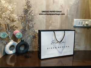 Wholesale Custom Printed Luxury Paper Shopping <b>Bag</b> with Rope Handles for Boutique Fashion Jewelry <b>Gift</b> and Retail Packaging - Product Image 1