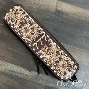ที่หนีบผมหนังแท้ ทนความร้อน รุ่น 777 ลายนำโชค ดีไซน์สวย สำหรับจัดแต่งทรงผม ซุปเปอร์เซปเทมเบอร์ - Product Image 1
