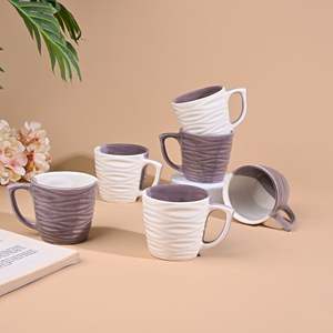 Set of 4 Amber Soft Pink Carved <b>Ceramic</b> <b>Cups</b> - Product Image 1