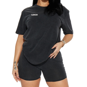 Conjunto de 2 piezas de pantalones cortos de punto para mujer, cuello redondo, manga corta, ajuste holgado, color negro sólido, informal, para primavera y verano, conjunto de top y pantalones cortos para uso diario - Product Image 1