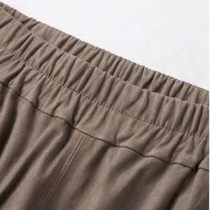 Jupe midi asymétrique pour femme, taille élastique, couleur unie, style minimaliste, tissu tissé, longueur cheville, confortable, à porter toute l'année - Product Image 4