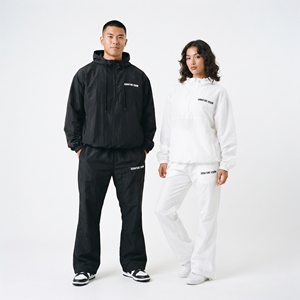 Survêtement coupe-vent 100% nylon léger et imperméable avec capuche et pantalon, coupe oversize, unisexe, idéal pour le camping et la pluie - Product Image 1
