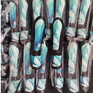 Protège-tibias d'arts martiaux sublimés à sangles réglables, manchons de compression en cuir à séchage rapide pour entraînement MMA Muay Thai OEM - Product Image 3