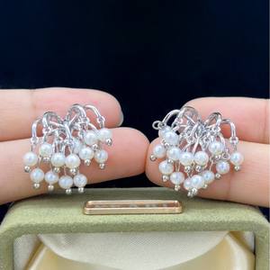 Boucles d'oreilles pendantes de luxe léger, design de niche, perles de feux d'artifice, micro-incrustations de zircon, sensation haut de gamme, nouveau style explosif - Product Image 3