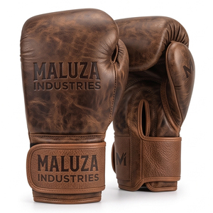 Guantes de Boxeo Profesionales de Cuero con Logotipo Personalizado, para Entrenamiento y Sparring, Unisex, Cierre de Velcro, Fabricante Mayorista - Product Image 1
