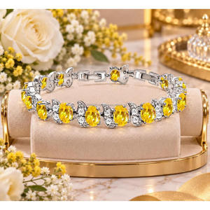 Pulsera de piedra ovalada de color amarillo vibrante, diseño de eslabones botánicos en tono plateado, joyería elegante y moderna para compradores mayoristas y minoristas - Product Image 1