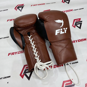 Gants de boxe personnalisés OEM ODM marron et noir à lacets, ajustables avec sangle de poignet, en cuir véritable de haute qualité pour les arts martiaux - Product Image 1