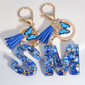 Wholesale Bestseller Royal Blue Butterfly Tassel Alphabet Keychain Drops Glue Resin <b>Initial</b> Letter Handcrafted High Quality - Product Image 1