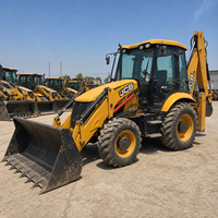 Chargeuse-pelleteuse JCB 4CX d'occasion avec moteur fiable