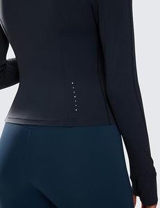 Vêtements de sport pour femmes, noirs, à demi-zip, manches longues, couleur unie, respirants, en polyester et élasthanne, coupe ajustée, col montant, avec poches - Product Image 5