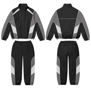 Ensemble de survêtement homme noir et gris à blocs de couleur, veste coupe-vent vintage à col montant et manches longues, pantalon respirant et à séchage rapide - Product Image 1