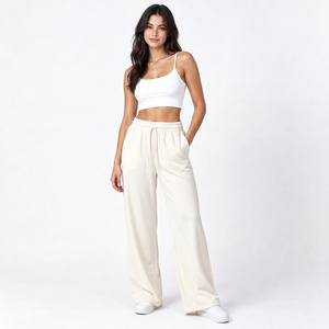 Pantalones deportivos de algodón para mujer, marca privada, con acabado de lavado en frío, estampado gráfico personalizado y puños acanalados - Product Image 1