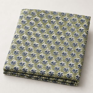 Tela de algodón estampada a mano con motivos florales en verde oliva y azul marino, con un pequeño diseño de hojas y un borde botánico grande, textil suave y transpirable. - Product Image 1