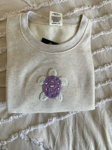 เสื้อปักลายลูกปัดทันสมัยพร้อมงานฝีมือประณีตและงานตกแต่งที่สะดุดตา - Product Image 1