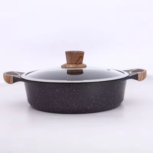 Ollas con revestimiento negro hechas de metal que ayudan a mantener la comida fresca y caliente, las cazuelas están diseñadas para un rendimiento y una durabilidad excepcionales. - Product Image 1