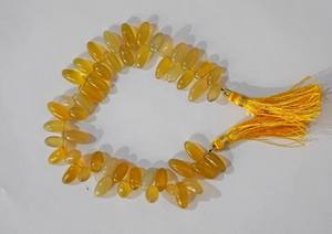 ลูกปัดหินแคลเซโดนีสีเหลืองธรรมชาติทรงข้าวเรียบ สำหรับทำเครื่องประดับ ขายส่ง - Product Image 3