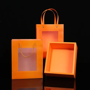 Bolsa de Mano Naranja con Ventana Transparente y Asa de Cinta, Juego de Cajas de Embalaje para Compras, Venta de Fábrica, Logotipo Personalizado, Tamaño Impreso, Ecológico - Product Image 1