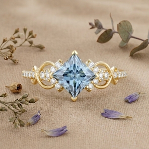 Anillo de compromiso de moissanita azul corte princesa con diseño de infinito en oro, anillo de boda vintage con halo para mujer - Product Image 1