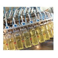 Machine de remplissage et de bouchage automatique de haute qualité pour l'huile comestible, l'huile de coco et l'huile d'arachide, disponible à la vente