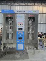 Machine de remplissage et de scellage manuelle Servo 12000 pour sachets de 150 ml à 1 L de boissons laitières, compatible avec film LLDPE