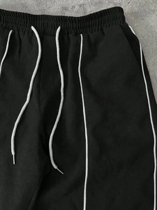 Conjunto Deportivo Personalizado OEM, Chaqueta Cortavientos de Nailon Suave y Pantalones Deportivos Estampados, Unisex, de Alta Calidad, Estilo Urbano - Product Image 4