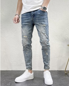 Hot Selling High Quality Stretchy Denim <b>Jeans</b> for <b>Men</b> Stylish Tapered Skinny <b>Jeans</b> <b>Ripped</b> Hole Designer Trousers <b>Jeans</b> - Product Image 1