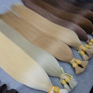 Cabello humano natural liso sin procesar al por mayor, reconocido por servir a fabricantes de extensiones de lujo y salones de alta gama. - Product Image 1