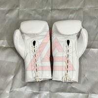 Fabrication en usine de gants de boxe blancs sur mesure, 100% cuir véritable, gants de boxe professionnels pour la pratique du fly boxing.