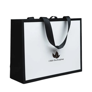 Sac en papier kraft de luxe personnalisé avec poignée Flexiloop, logo gaufré fait main et ruban, idéal pour la vente au détail, les vêtements, les supermarchés et le vin - Product Image 1