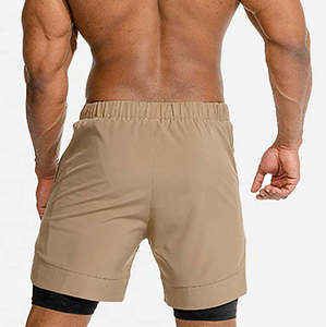 Shorts de sport pour homme en polyester tricoté, couleur unie, séchage rapide, respirant, taille mi-haute avec cordon de serrage et poches - Product Image 6