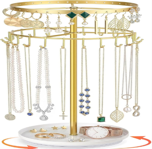Rotating two-tier gold metal jewellery display stand with <b>hooks</b> and catchall dish base, available at wholesale prices. - Product Image 1