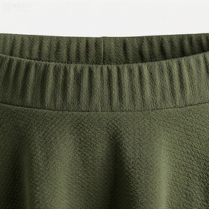 Jupe courte plissée vert olive pour femme, taille élastique, couleur unie, décontractée, toutes saisons - Product Image 4