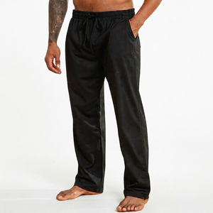 Pantalon de survêtement noir en polyester pour adultes, taille élastique, coupe ample mi-taille, longueur intégrale, poches latérales, décontracté pour le printemps - Product Image 1