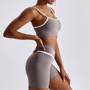 Conjunto doble de cintura alta con logotipo personalizado para mujer, pantalones cortos de motorista y Sujetador deportivo para ropa de yoga lisa, conjunto de pantalones cortos de sujetador sin costuras - Product Image 6