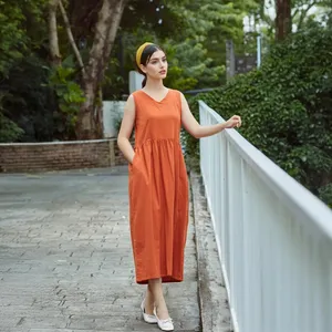 เดรสยาวผ้าฝ้ายลินินสไตล์โบฮีเมียน สีส้มสนิม แขนกุด ทรงเอไลน์ หลวมสบาย ใส่ได้ในฤดูร้อน - Product Image 1