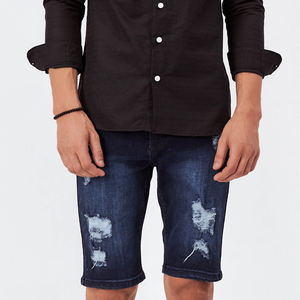 กางเกงยีนส์ขาสั้นผู้ชายทรงตรงสไตล์ลำลองสำหรับฤดูร้อน ปี 2026 คุณภาพสูง ระบายอากาศได้ดี เป็นมิตรกับสิ่งแวดล้อม ผ้าถักแบบดิสเทรส วอช ดีไซน์เท่ - Product Image 1