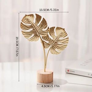 Decorazione in Metallo Stile Scandinavo di Lusso con Foglia di Ginkgo, Arte Creativa per Soggiorno, Ingresso e Vetrina del Vino - Product Image 1